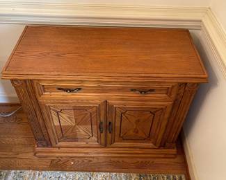 D1 - $150. Giuseppe Arcase English Oak buffet. Measures 38” wide x 17” Deep x  30.5” tall. 