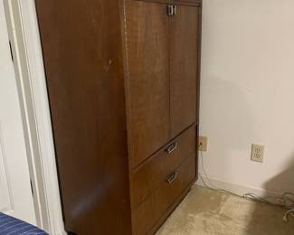 D25 - $400. Stanley bedroom set. Queen size bed, side table, tall, dresser, short dresser with two wall hanging mirrors. Bedside table measures 25” wide x 16” deep x 21.75” tall. Top is worn. Veneer chipped on the bottom.  Tall dresser measures 36” wide x 18.5” deep x 54” tall. Four drawers and three cubbies. Wear on doors from use.  Queen size headboard 49” tall. Mattress was used with a cover on it. Frame is on wheels. Frame is attached to the headboard. Long dresser measures 74” wide x 18.5” deep x 29.5 inches tall. Nine drawers. Some wear and veneer chipped off. Solid construction. Two mirrors measure 19“ wide x 45“ tall. 