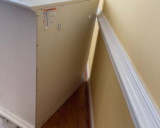 D22 - $350. Haverty’s Edisto accent cabinet. Great condition and solid construction. Distressed white cabinet with glass doors and one shelf. Has a small hole cut in the back to use for electronics. Measures 36” wide  x18” deep x 39” tall. 