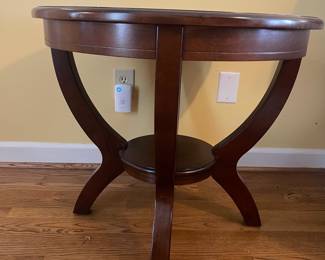 D8 - $125. Pair of Haverty’s end tables. Sturdy and solid. Measures 28” diameter x 24” tall. 