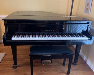 D5 - $3000. Samick black lacquered piano with bench. Last 2 keys stick a bit. 