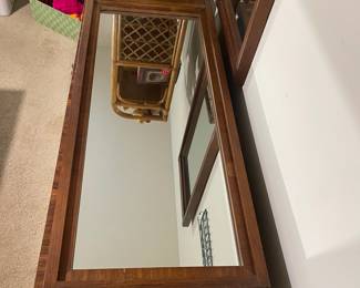 D25 - $400. Stanley bedroom set. Queen size bed, side table, tall, dresser, short dresser with two wall hanging mirrors. Bedside table measures 25” wide x 16” deep x 21.75” tall. Top is worn. Veneer chipped on the bottom.  Tall dresser measures 36” wide x 18.5” deep x 54” tall. Four drawers and three cubbies. Wear on doors from use.  Queen size headboard 49” tall. Mattress was used with a cover on it. Frame is on wheels. Frame is attached to the headboard. Long dresser measures 74” wide x 18.5” deep x 29.5 inches tall. Nine drawers. Some wear and veneer chipped off. Solid construction. Two mirrors measure 19“ wide x 45“ tall. 