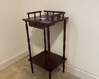 D12 - $50.  Vintage Telephone Table with small drawer and shelf. Measures 13.5” wide x 1.5” deep x 28” tall. 