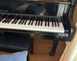 D5 - $3000. Samick black lacquered piano with bench. Last 2 keys stick a bit. 