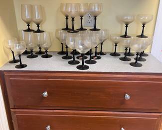 D20 - $75. Fostoria Eloquence Onyx glasses. (2-6”, 6-6.5”, 14-7.25”, 8-5.5”)