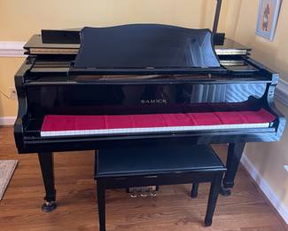 D5 - $3000. Samick black lacquered piano with bench. Last 2 keys stick a bit. 