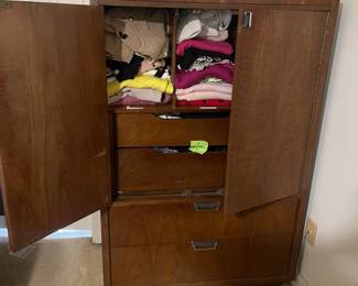 D25 - $400. Stanley bedroom set. Queen size bed, side table, tall, dresser, short dresser with two wall hanging mirrors. Bedside table measures 25” wide x 16” deep x 21.75” tall. Top is worn. Veneer chipped on the bottom.  Tall dresser measures 36” wide x 18.5” deep x 54” tall. Four drawers and three cubbies. Wear on doors from use.  Queen size headboard 49” tall. Mattress was used with a cover on it. Frame is on wheels. Frame is attached to the headboard. Long dresser measures 74” wide x 18.5” deep x 29.5 inches tall. Nine drawers. Some wear and veneer chipped off. Solid construction. Two mirrors measure 19“ wide x 45“ tall. 
