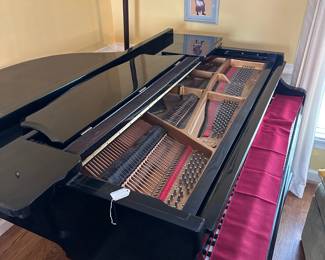 D5 - $3000. Samick black lacquered piano with bench. Last 2 keys stick a bit. 