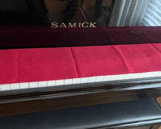 D5 - $3000. Samick black lacquered piano with bench. Last 2 keys stick a bit. 