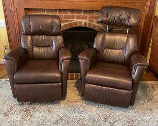 D4 - $750 each. 2 available. Haverty’s Magnus leather power swivel recliners. Brandy color pattern.  These are on the smaller side. Ideal for someone around 5’5”.   Measures 32”wide x 31”deep x 39” tall. Extremely comfortable and in great condition. No pets or smoking. 