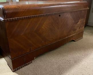 D26 - $75. Lane Cedar Hope chest. Measures 47” wide x 19” deep x 22.5” tall.