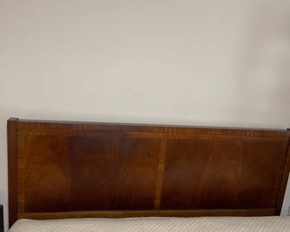 D25 - $400. Stanley bedroom set. Queen size bed, side table, tall, dresser, short dresser with two wall hanging mirrors. Bedside table measures 25” wide x 16” deep x 21.75” tall. Top is worn. Veneer chipped on the bottom.  Tall dresser measures 36” wide x 18.5” deep x 54” tall. Four drawers and three cubbies. Wear on doors from use.  Queen size headboard 49” tall. Mattress was used with a cover on it. Frame is on wheels. Frame is attached to the headboard. Long dresser measures 74” wide x 18.5” deep x 29.5 inches tall. Nine drawers. Some wear and veneer chipped off. Solid construction. Two mirrors measure 19“ wide x 45“ tall. 