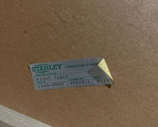 D25 - $400. Stanley bedroom set. Queen size bed, side table, tall, dresser, short dresser with two wall hanging mirrors. Bedside table measures 25” wide x 16” deep x 21.75” tall. Top is worn. Veneer chipped on the bottom.  Tall dresser measures 36” wide x 18.5” deep x 54” tall. Four drawers and three cubbies. Wear on doors from use.  Queen size headboard 49” tall. Mattress was used with a cover on it. Frame is on wheels. Frame is attached to the headboard. Long dresser measures 74” wide x 18.5” deep x 29.5 inches tall. Nine drawers. Some wear and veneer chipped off. Solid construction. Two mirrors measure 19“ wide x 45“ tall. 