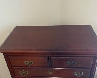 D10 - $150. Solid wood 5-drawer dresser. Measures 36” wide x 18.5” deep x 49” tall. 