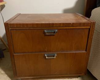 D25 - $400. Stanley bedroom set. Queen size bed, side table, tall, dresser, short dresser with two wall hanging mirrors. Bedside table measures 25” wide x 16” deep x 21.75” tall. Top is worn. Veneer chipped on the bottom.  Tall dresser measures 36” wide x 18.5” deep x 54” tall. Four drawers and three cubbies. Wear on doors from use.  Queen size headboard 49” tall. Mattress was used with a cover on it. Frame is on wheels. Frame is attached to the headboard. Long dresser measures 74” wide x 18.5” deep x 29.5 inches tall. Nine drawers. Some wear and veneer chipped off. Solid construction. Two mirrors measure 19“ wide x 45“ tall. 