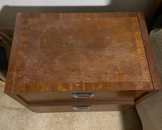 D25 - $400. Stanley bedroom set. Queen size bed, side table, tall, dresser, short dresser with two wall hanging mirrors. Bedside table measures 25” wide x 16” deep x 21.75” tall. Top is worn. Veneer chipped on the bottom.  Tall dresser measures 36” wide x 18.5” deep x 54” tall. Four drawers and three cubbies. Wear on doors from use.  Queen size headboard 49” tall. Mattress was used with a cover on it. Frame is on wheels. Frame is attached to the headboard. Long dresser measures 74” wide x 18.5” deep x 29.5 inches tall. Nine drawers. Some wear and veneer chipped off. Solid construction. Two mirrors measure 19“ wide x 45“ tall. 