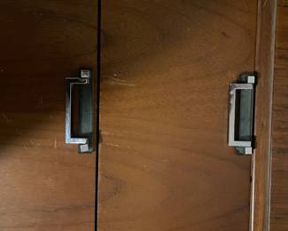 D25 - $400. Stanley bedroom set. Queen size bed, side table, tall, dresser, short dresser with two wall hanging mirrors. Bedside table measures 25” wide x 16” deep x 21.75” tall. Top is worn. Veneer chipped on the bottom.  Tall dresser measures 36” wide x 18.5” deep x 54” tall. Four drawers and three cubbies. Wear on doors from use.  Queen size headboard 49” tall. Mattress was used with a cover on it. Frame is on wheels. Frame is attached to the headboard. Long dresser measures 74” wide x 18.5” deep x 29.5 inches tall. Nine drawers. Some wear and veneer chipped off. Solid construction. Two mirrors measure 19“ wide x 45“ tall. 