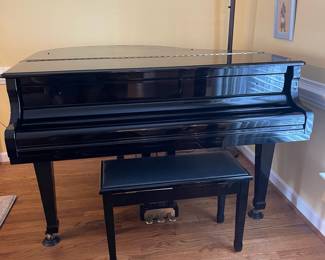 D5 - $3000. Samick black lacquered piano with bench. Last 2 keys stick a bit. 
