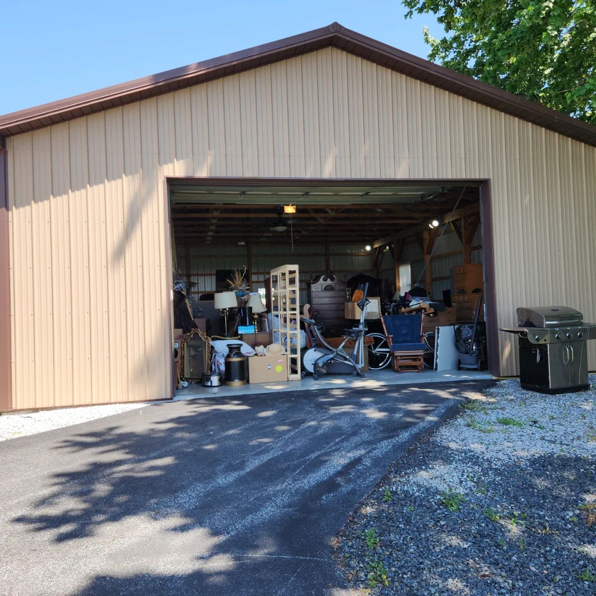 Family member inherited the property and moved EVERYTHING from the house into this large, clean, enameled floor outbuilding.