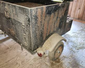 Custom made propane fueled grill on trailer. Has tires but YOU WILL NEED TO BRING A TRAILER TO TAKE IT HOME