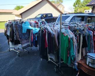 7 six foot racks of quality ladies clothing. Lots still w tags and lots just from dry cleaner