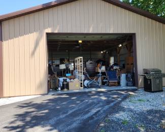Family member inherited the property and moved EVERYTHING from the house into this large, clean, enameled floor outbuilding.