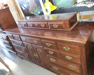 Bedroom set by Broyhill (long dresser w jewelry top, chest of drawers, Queen 4 post head/footboard and 2 end tables)