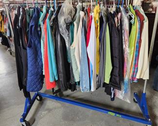 7 six foot racks of quality ladies clothing. Most sized Medium