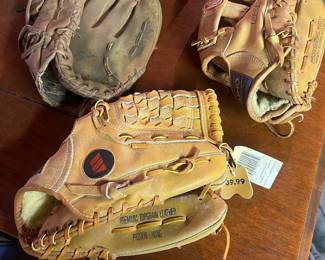 3 gloves, 1 new with tags