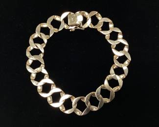 8.25inch 14k 13mm Curb link 31.1 grams This bracelet features nugget style texture outside and smooth polish inside for comfortable everyday wear