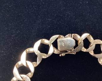 8.25inch 14k 13mm Curb link 31.1 grams This bracelet features nugget style texture outside and smooth polish inside for comfortable everyday wear