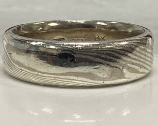  14k Mokume Gane ring 13.7 grams size 12.5, 7mm wide. Made by artist David Emslie by forging different precious metal to create wood grain pattern. Base metal is 14k gold