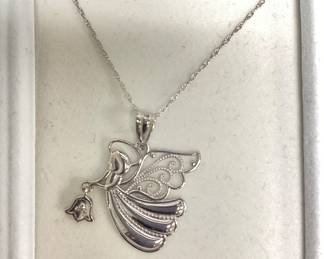 10k white gold angel pendant, chain 1.35 grams
