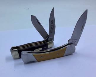 2) Buck pocket knives NRA 380.1 and 506 model