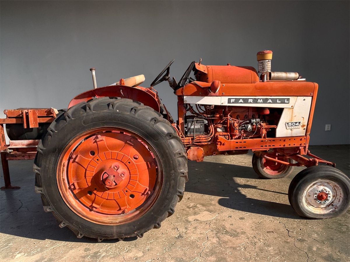 1952 Farmall Tracor with 6 implements