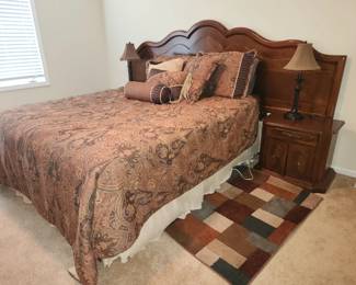 Queen bed with extended headboard and built-in nightstands