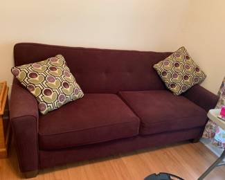 #29	Purpe sofa solid back 8-" long. You move from bedroom	 $65.00 					