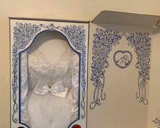 #141	Vintage Wedding Dress in sealed dry cleaners box	 $20.00 			