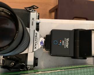 #145	Pentax film camera w Gemi zoom lens 80-250, Vivitar flash	 $40.00 			