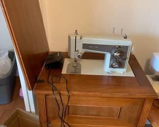 #26	Sears sewing machine in cabinet w peddle 24x18x30	 $30.00 			