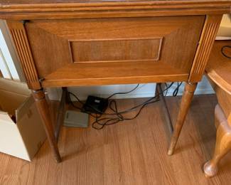 #26	Sears sewing machine in cabinet w peddle 24x18x30	 $30.00 			