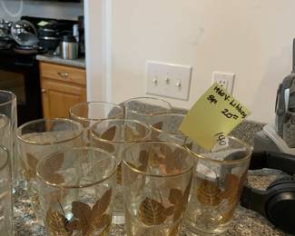 #140	1960's Vintage Libby 8 pc glasses w gold leaves	 $20.00 			