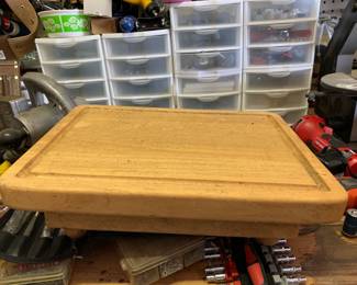 #127	footed Cutting Board 16x12x5" as is dirty	 $20.00 			