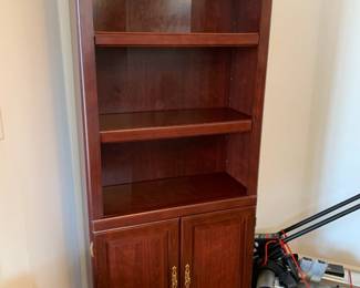 #11	Laminent 2 shelf, 2 door bookcase 30x12x72	 $30.00 			