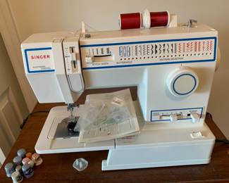 #23	Singer sewing machine w electric controls model 5932	 $75.00 			