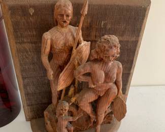 #56	Wood carving of family mom, dad and baby 11" tall	 $75.00 			