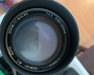 #145	Pentax film camera w Gemi zoom lens 80-250, Vivitar flash	 $40.00 			