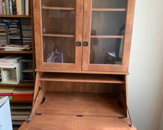 #62	Secretary desk laminent 2 drawers, 2 glass doors, flip down desk 34x22-35x77"	 $75.00 			