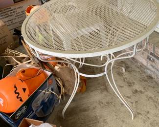 #37	Round metal patio table 30x29"	 $45.00 			