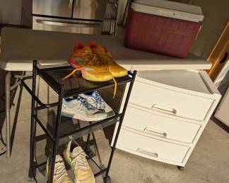 KR279Foldable Table, Coleman Cooler, Shoe Rack With Athletic Shoes Sizes 7 In Womens And 14 In Mens 